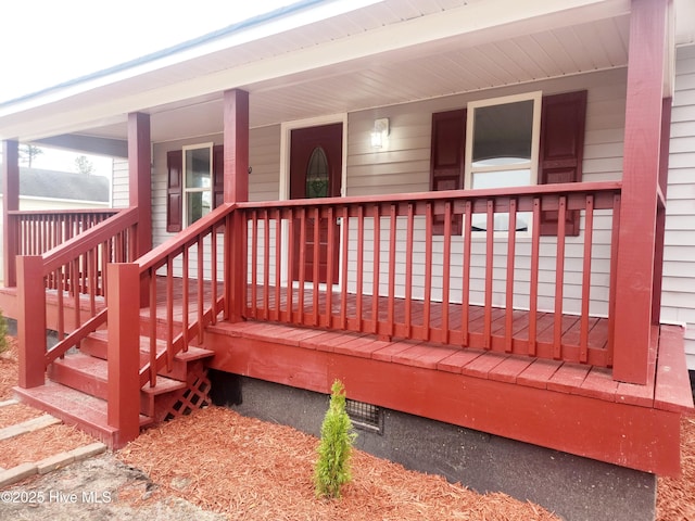 wooden deck featuring covered porch