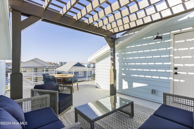 view of patio with an outdoor living space and a pergola