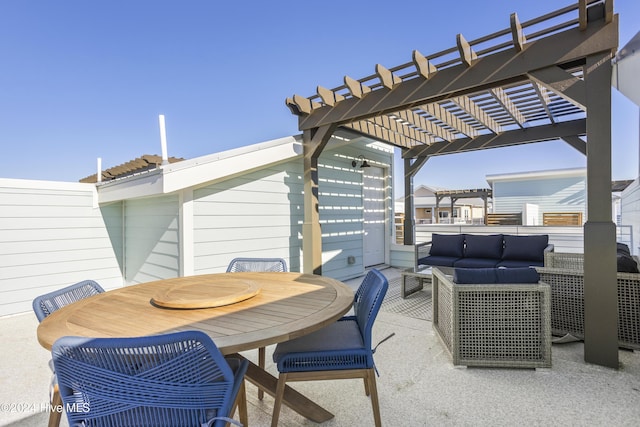 view of patio with a pergola and outdoor lounge area