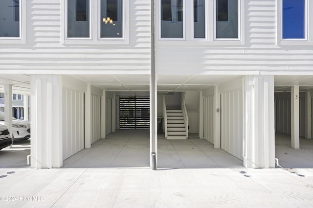 exterior space featuring a carport