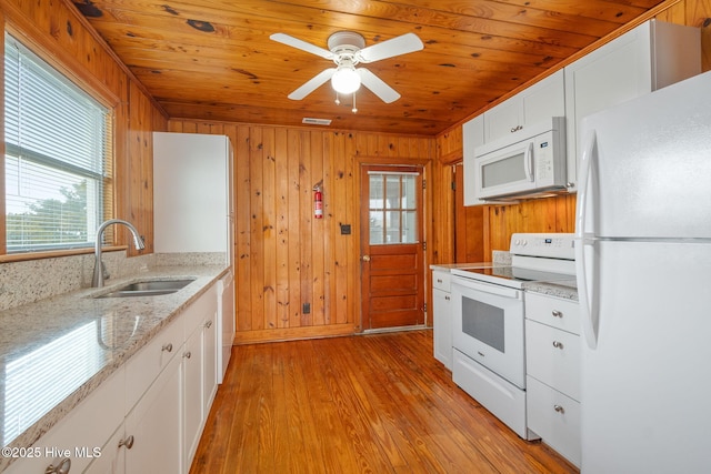 kitchen with white cabinetry, sink, wooden ceiling, and white appliances