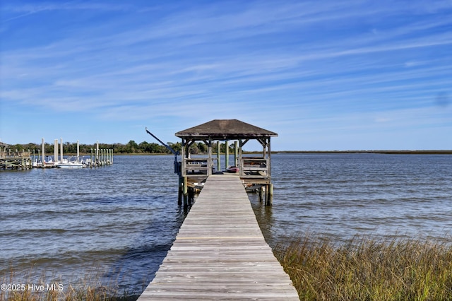 view of dock with a water view