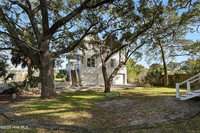 view of yard with a garage