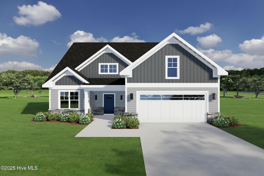 craftsman inspired home with a garage and a front lawn