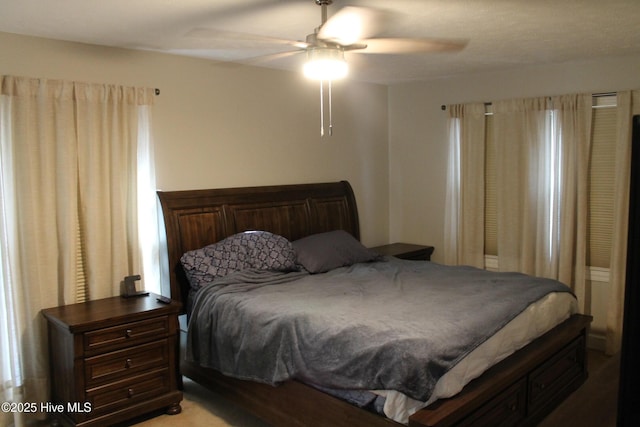 bedroom featuring ceiling fan