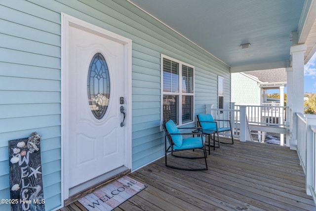 deck with covered porch