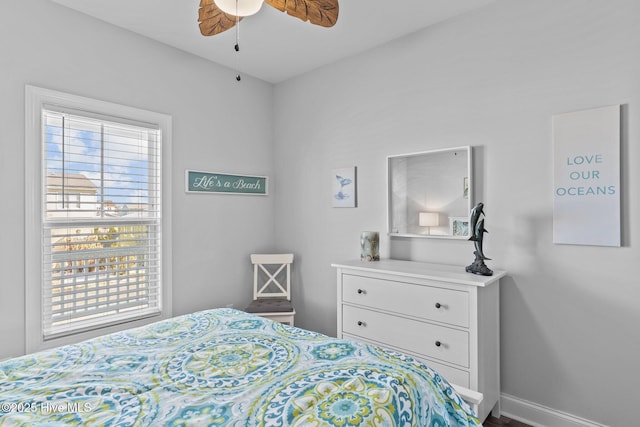 bedroom featuring multiple windows