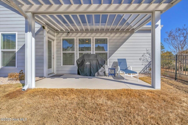 rear view of house featuring a yard and a patio area