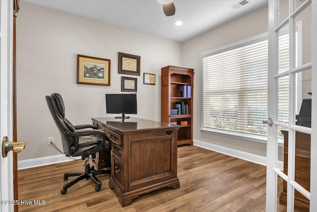 office area featuring ceiling fan and light wood-type flooring