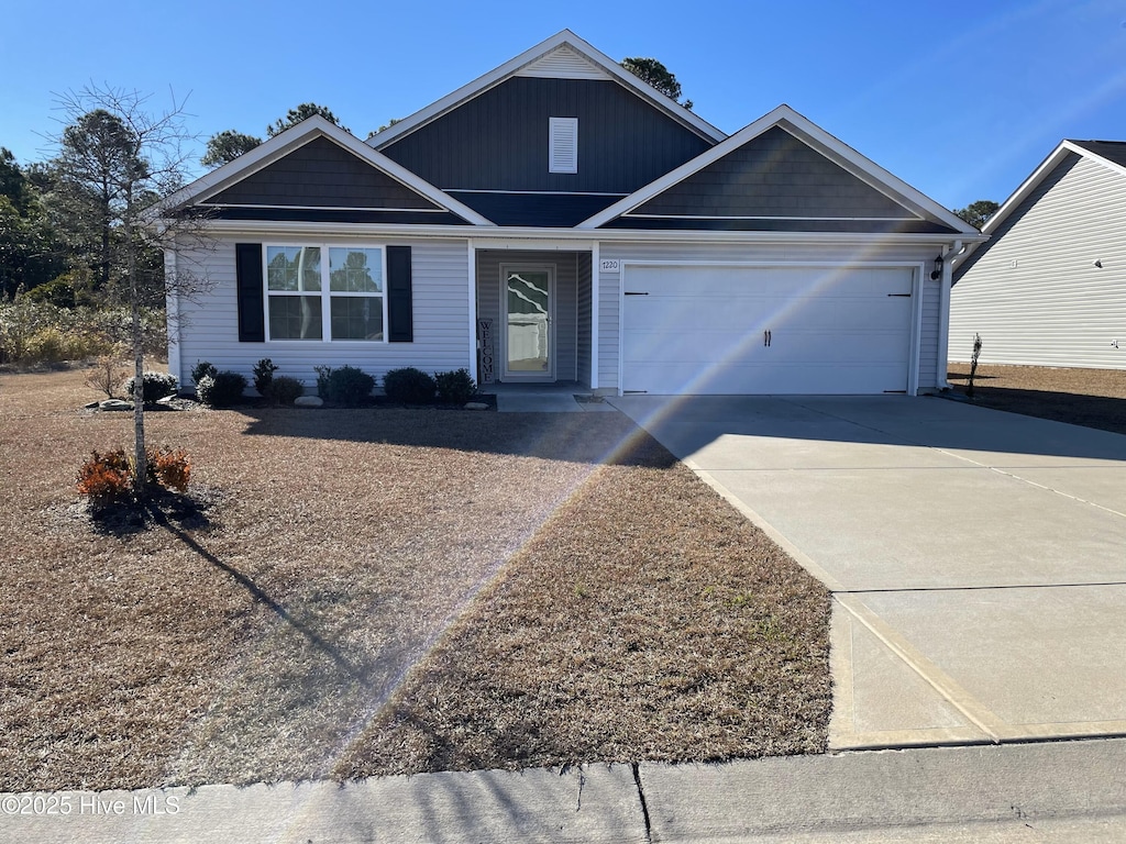 view of front of home with a garage