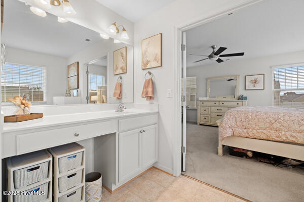 bathroom featuring vanity, tile patterned floors, and ceiling fan