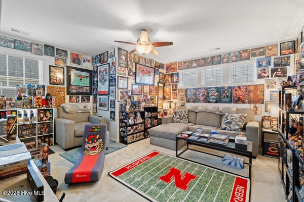 living room with ceiling fan