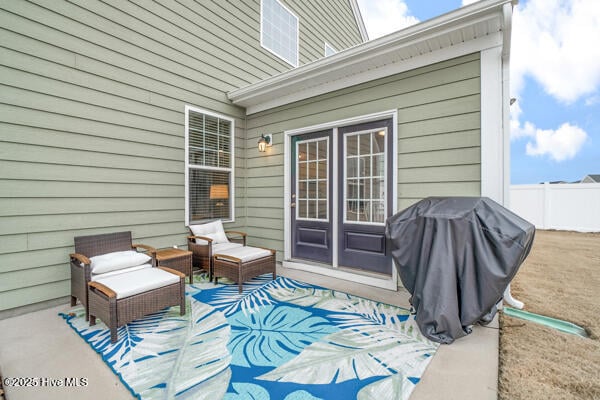 view of patio featuring a grill