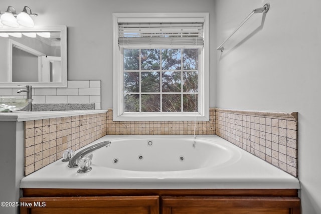 bathroom featuring sink and a tub