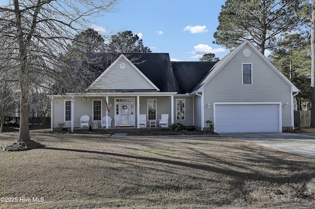 view of front of house with a garage and a porch