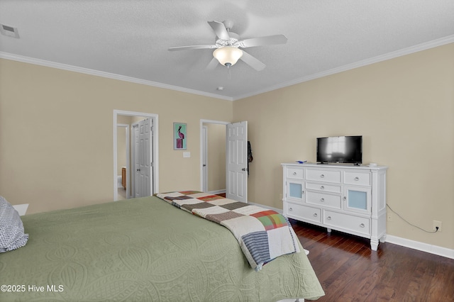 bedroom featuring ornamental molding, dark hardwood / wood-style floors, and a textured ceiling