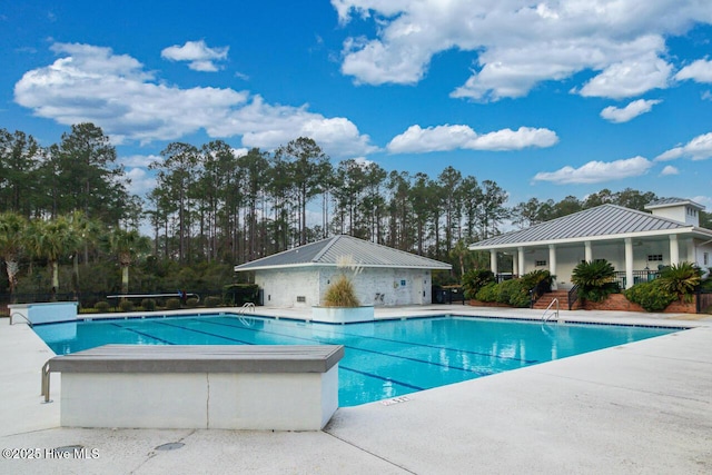 pool with a patio area