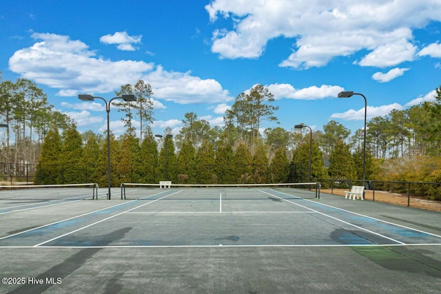 view of sport court with fence and community basketball court