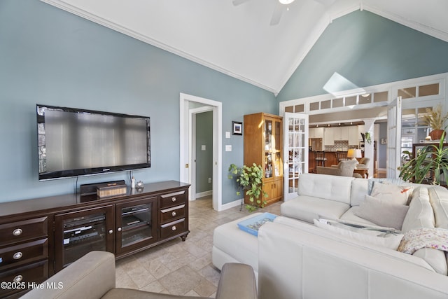 living room featuring high vaulted ceiling and ceiling fan