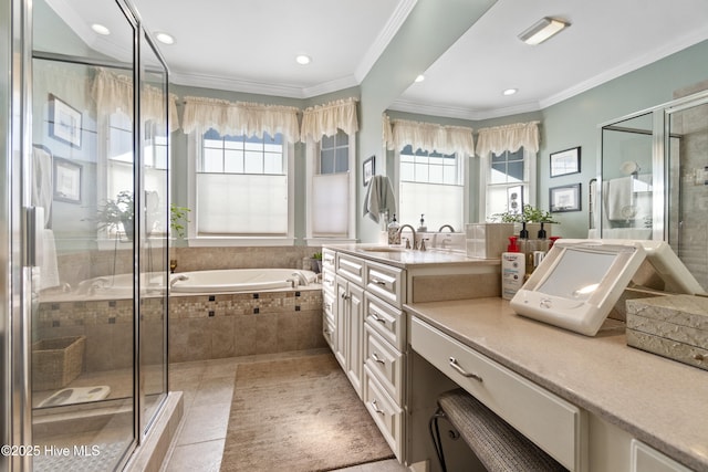 bathroom featuring vanity, crown molding, a healthy amount of sunlight, and separate shower and tub