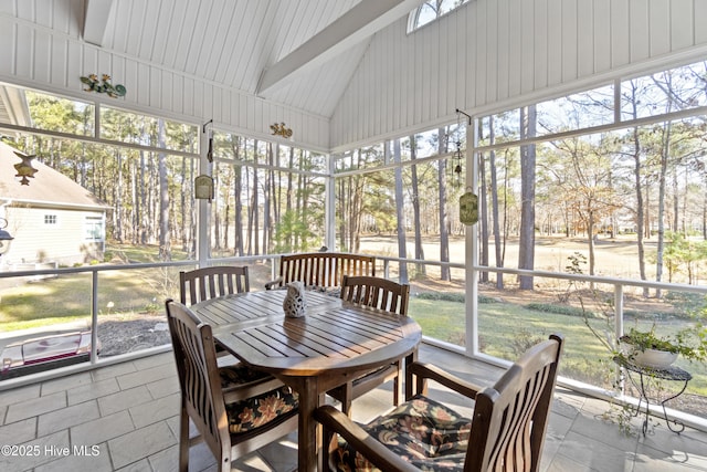 sunroom with lofted ceiling