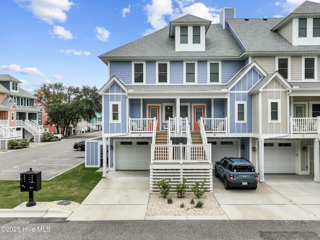 view of front of home featuring a garage and covered porch