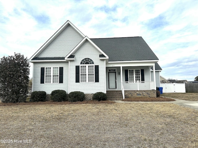 view of front of house featuring a front lawn and a porch