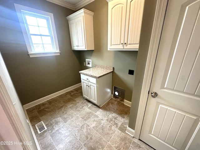 laundry area with cabinets, ornamental molding, and hookup for a washing machine