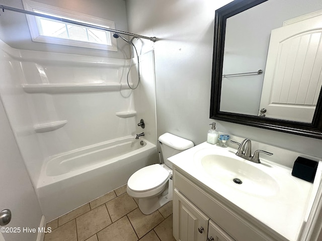 full bathroom featuring vanity, tile patterned floors, toilet, and shower / washtub combination