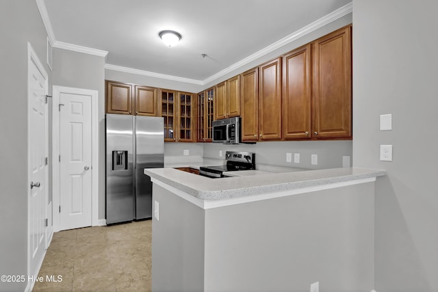 kitchen with ornamental molding, appliances with stainless steel finishes, and kitchen peninsula