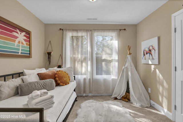 sitting room with carpet floors