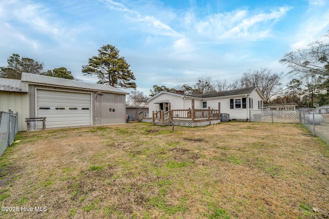 view of yard with a fenced backyard and a deck