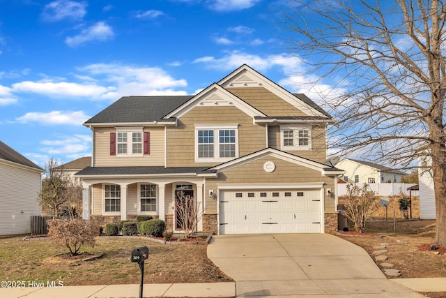 craftsman house with a garage and central AC