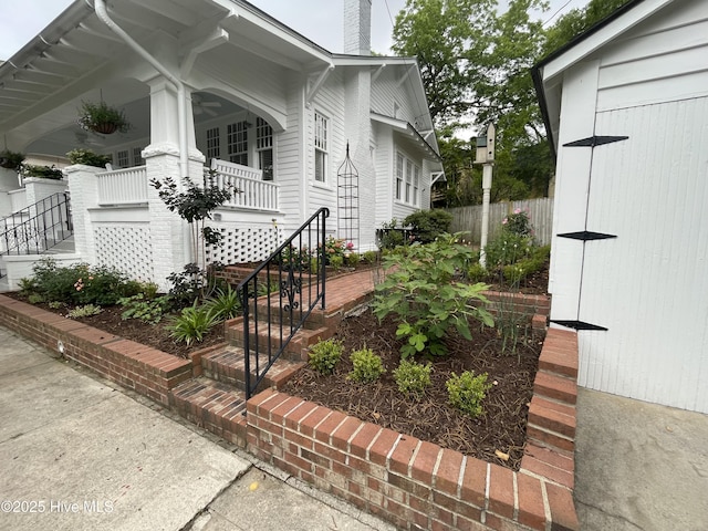 view of home's exterior featuring covered porch