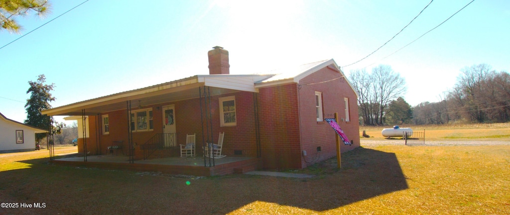 exterior space with a front yard