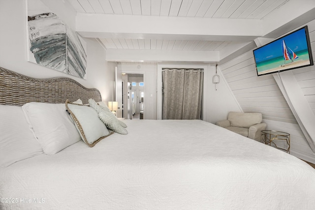 bedroom with wooden ceiling and beamed ceiling