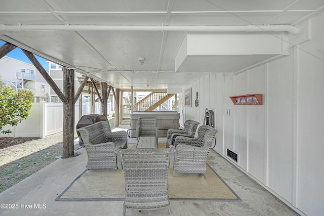 view of patio / terrace featuring visible vents, fence, and outdoor lounge area