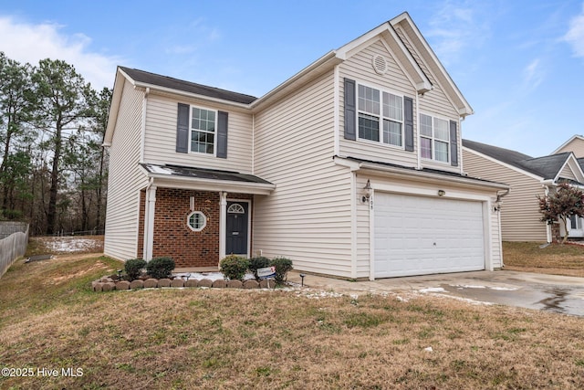 view of front of house featuring a garage and a front lawn