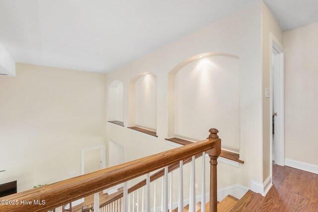 232 E Ivybridge Dr, Hubert, NC 28539 - corridor featuring an upstairs landing, wood finished floors, and baseboards