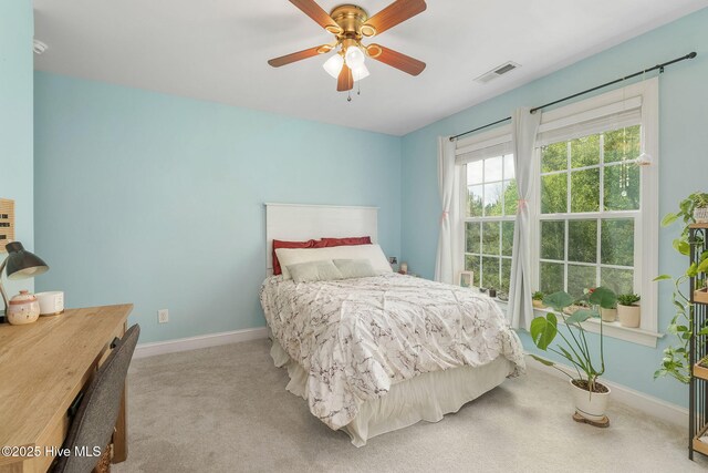 232 E Ivybridge Dr, Hubert, NC 28539 - carpeted bedroom featuring baseboards and a ceiling fan