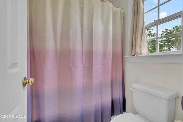 232 E Ivybridge Dr, Hubert, NC 28539 - bathroom featuring toilet and curtained shower