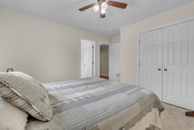 232 E Ivybridge Dr, Hubert, NC 28539 - bedroom featuring a closet, light colored carpet, and ceiling fan