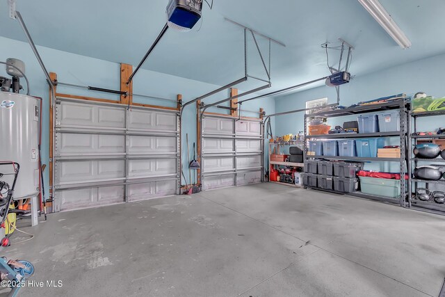 232 E Ivybridge Dr, Hubert, NC 28539 - garage featuring water heater and a garage door opener