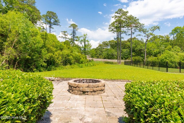 232 E Ivybridge Dr, Hubert, NC 28539 - view of patio / terrace with a fire pit