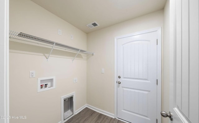 laundry room featuring dark wood-type flooring, washer hookup, and hookup for an electric dryer