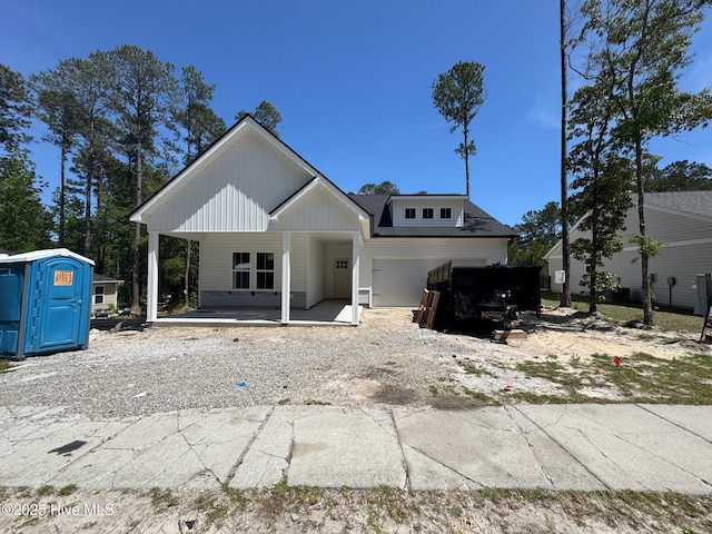 view of front of property featuring a garage