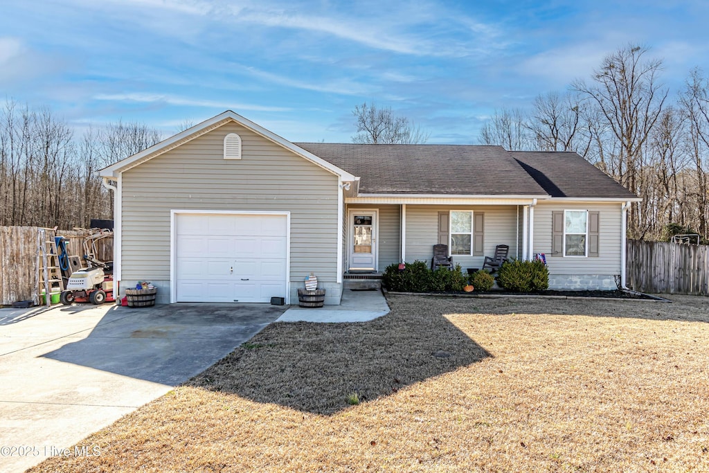 ranch-style home featuring a garage