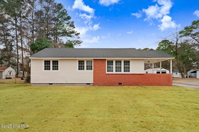 ranch-style home with a front yard