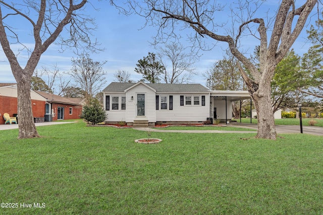 ranch-style home with a carport and a front lawn