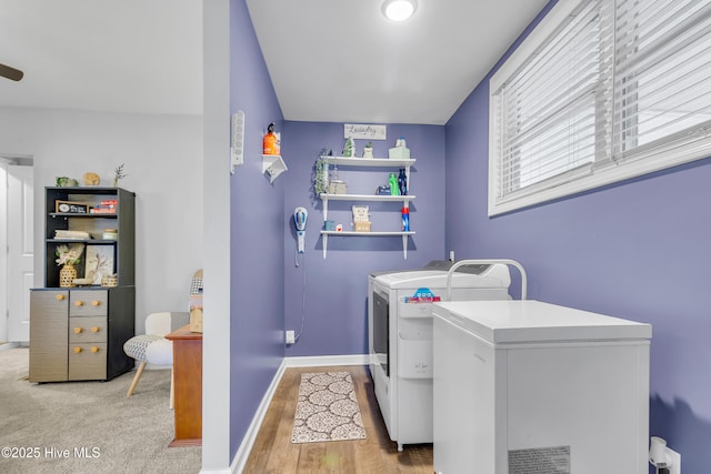 washroom featuring washer and clothes dryer